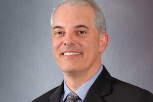 JohnS.AdamsCFP-UBS-HowDoYouGetAheadInAmerica-GreenMoney