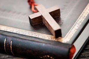 Loving Our Neighbor in a Time of Crisis-by Stella Tai-Praxis Mutual Funds-GreenMoney